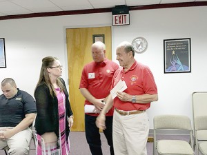 DONATION: At left, Diane Wise, exceptional education director, accepted a check in the amount of $2,000 from Bryan Cassange and Ron Sperier of Picayune’s Knights of Columbus. The money will be used for the Picayune School District’s special education program. Photo by Cassandra Favre