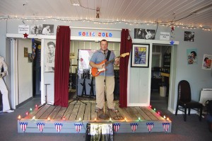 MUST GO ON: Tim Burns began learning to play the guitar when he was four-years old. His love of music is what inspired him to open Picayune’s Sold Gold Theater. Photo by Cassandra Favre
