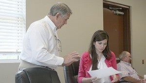 LEGAL MATTERS: Pearl River County Utility Authority board president Steve Lawler talks to board attorney Heather Ladner before Thursday’s meeting. The meeting covered a proposed budget for the coming fiscal year. Photo by Jeremy Pittari