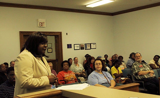 BUDGET REQUEST: PRC Case Manager Lillie Crawford, along with dozens of her clients, requested the board to consider approving an additional staff member at PRVO in order to serve residents in need across the county. Photo by Ashley Collins.