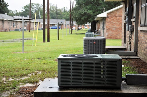 HOUSING INSPECTION: Pictured, air conditioning units serve public housing apartments located on North Beech St. Photo by Ashley Collins.