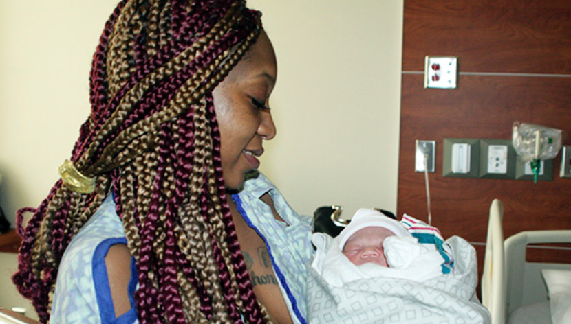 NEW YEAR’S BABY: Anita Burnett holds her baby boy, Kash’ion, born at 5:37 a.m. on Jan. 1 making him the first baby to be born at Highland Community 