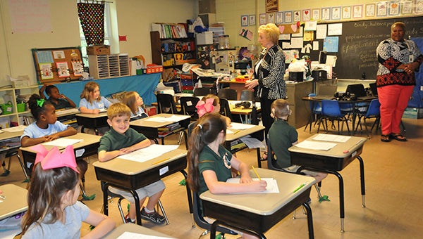 STATELY VISIT: Mississippi State Superintendent of Education Dr. Carey Wright speaks with first graders in Cindy Sutfin’s class at Poplarville Lower Elementary.  Photo by Cassandra Favre 