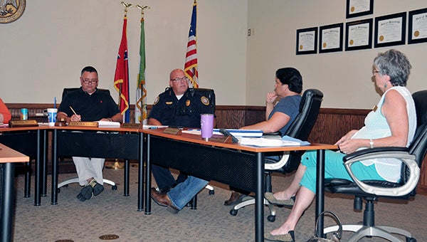 OVERTIME: The Poplarville Board of Aldermen discussed police officer’s overtime hours with police chief Butch Raby during Friday’s budget workshop.  Photo by Cassandra Favre 