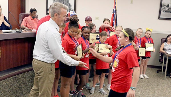 CHAMPIONS: Members of the Picayune Hot Shots, a youth softball team, were recognized during Tuesday’s Picayune City Council meeting with certificates for bringing home the 10U Mississippi State Championship.  Photo by Jeremy Pittari