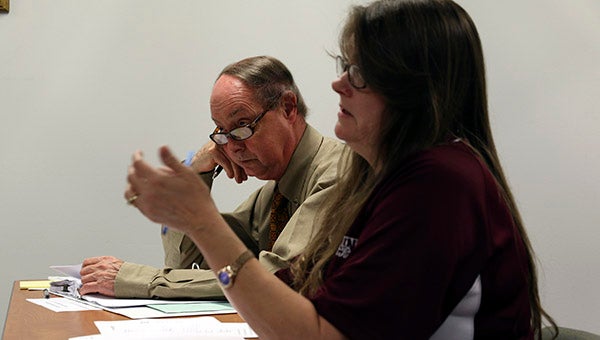 BUDGET DISCUSSIONS: Picayune School District Finance Director Lisa Persick, at right, discusses the next fiscal year’s proposed budget, while Assistant Superintendent Brent Harrell looks on.  Photo by Jeremy Pittari