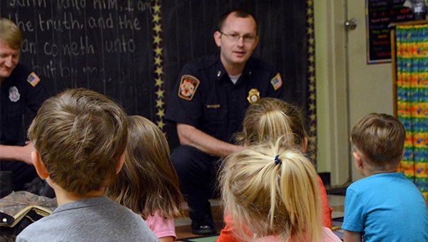 Poplarville Fire Chief Jonathan Head spoke to pre-k students about having an escape plan at home in case of a fire. Photo by Julia Arenstam 