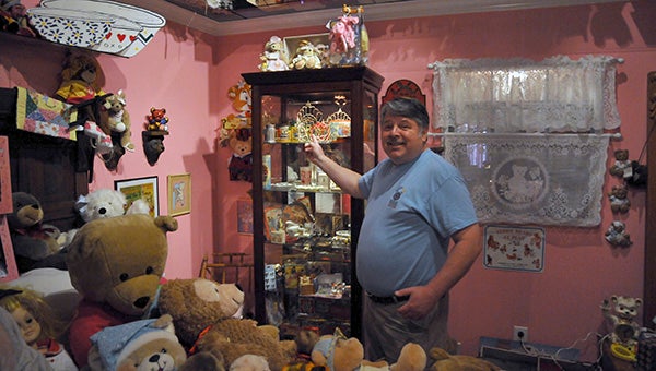 BEARY CHRISTMAS: Ricky Lenart reveals the beginning stages of the Christmas displays in the Teddy Bear House Museum.