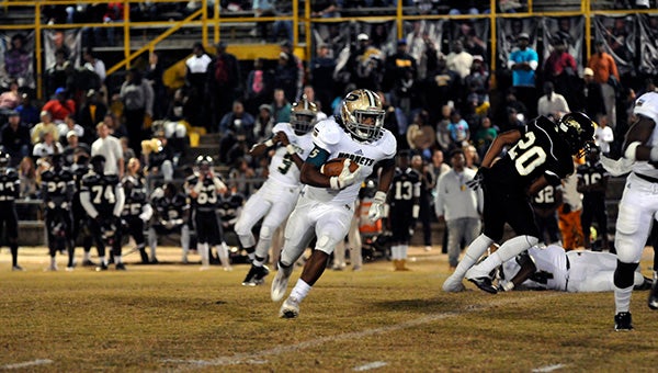 Poplarville's Austin Bolton made it to the end zone twice during Friday's game against Mendenhall. The team advances to the fourth round of the playoffs. Photo by Julia Arenstam