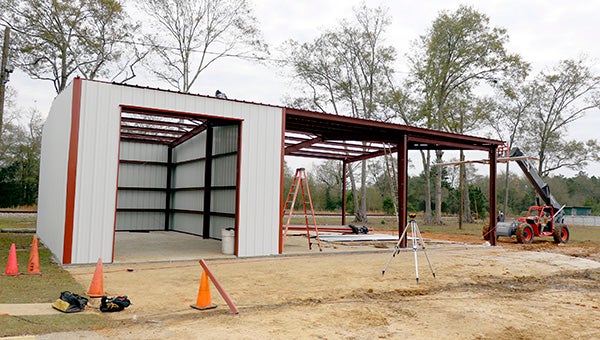 STORAGE SPACE: This metal building is being erected next to the Carriere Volunteer Fire Department on U.S. 11. It will include a truck bay and large pavilion when complete.  Photo by Jeremy Pittari