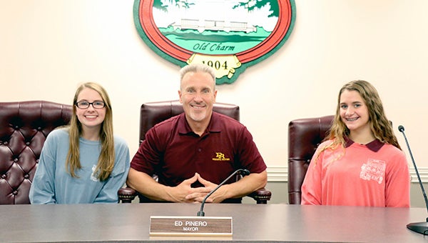 CLASS PROJECT: Our Lady Academy in Bay St. Louis students attend Tuesday’s Picayune City Council meeting.  From left are Hannah Meyer, Mayor Ed Pinero and Betty Clark.  Photo by Jeremy Pittari