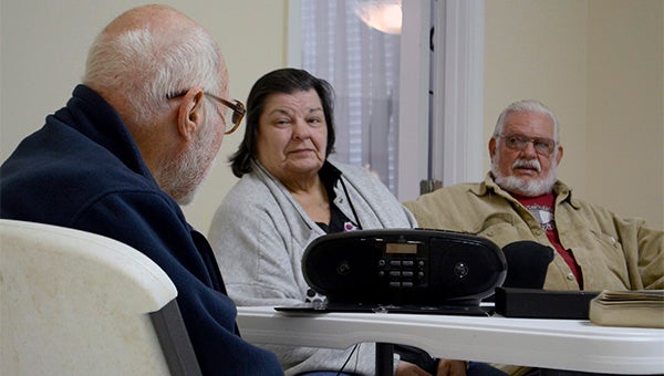 Learning together: From left to right, James Darwin,  Annette James and Frank Egger discuss the importance of learning Spanish in today’s world.   Photo by Julia Arenstam