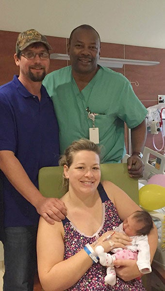 From the left, Joshua Carr, father; Samantha Carr, mother; and Dr. Kevin Galloway.