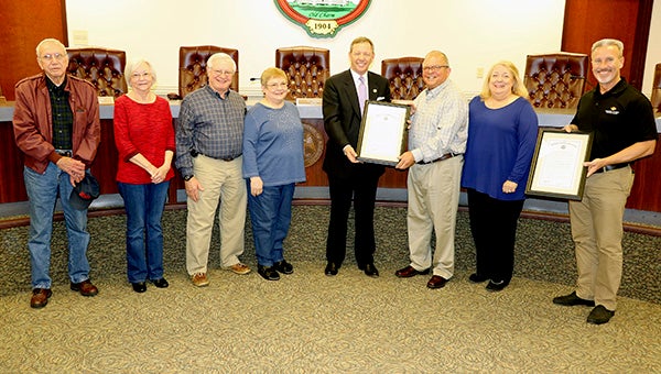 REMEMBRANCE: Family members of the late William “Buntsy” Sheffield gathered at City Hall in Picayune Friday to hear a proclamation from Representative Mark Formby.  From left are Jerry Sheffield (brother), Ann Sheffield, John Marquez, Ann Sheffield Marquez (daughter), Representative Mark Formby, Billy Sheffield (son), Linda Sheffield and Mayor Ed Pinero. Photo by Jeremy Pittari