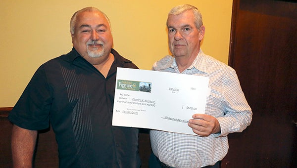FACADE GRANT: Charles Vincent Nuccio, of HotRod Heaven, was presented with a $500 facade grant by Picayune Main Street Inc. Vice President Roy McManus.  Photo by Jeremy Pittari