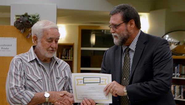 RECOGNITION: Ed Sternod, left, was recognized by Superintendent Carl Merrit during Monday’s meeting. Photo by Julia Arenstam
